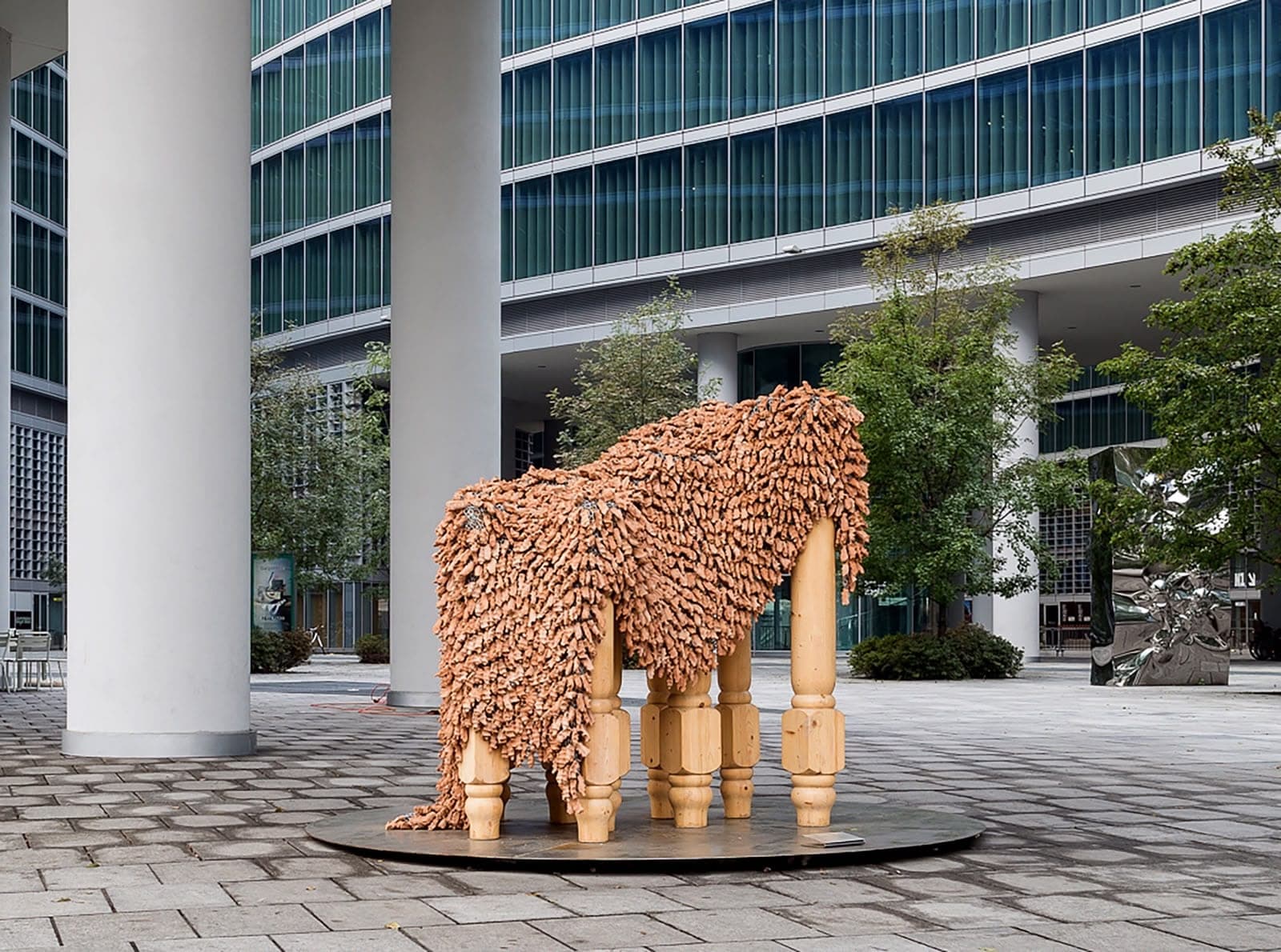 A public sculpture in the piazza: fragments drawn together in shared space.