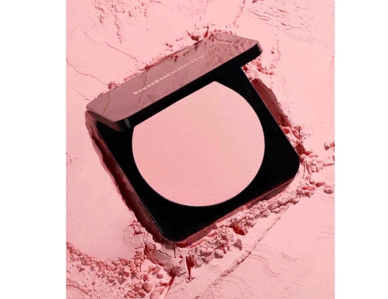 Pressed powder, broken into.